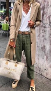 V-Neck white tee paired with olive green trousers, beige coat, statement bag and espadrilles for a perfect transitional outfit for Spring or Autumn