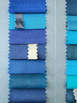 Collection of blue fabric swatches in different shades and textures for design inspiration.